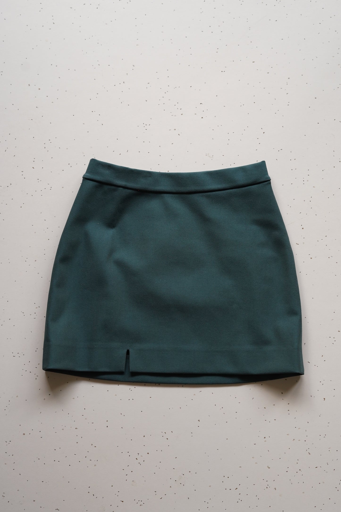 Green mini skirt